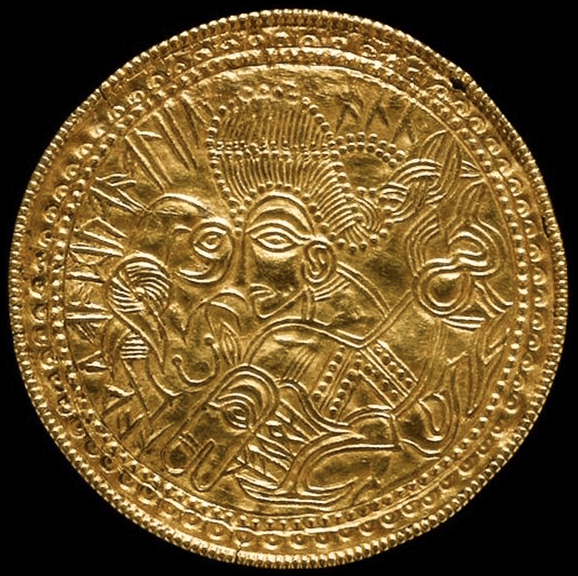Golden amulet depicting Odin