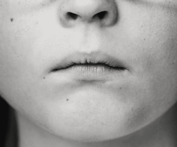 Closeup of a young boy's mouth and nose
