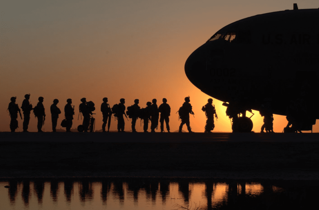 Soldiers leaving combat by plane