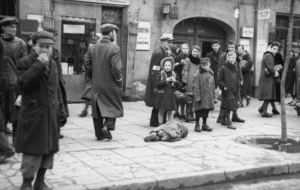 Individuals suffering in the Warsaw Ghetto