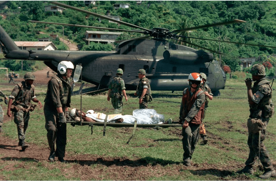 Marine corps helicopter transporting injured. Some of these men may seek treatment as veterans