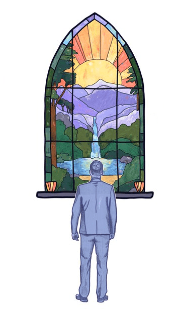 Man with yamaka looking at stained glass window of sun rising over mountains, river, and forest for story by Eli Ehrenpreis