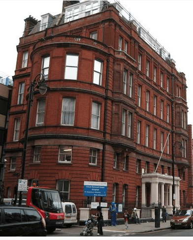 Red brick building of Great Ormond Street Hospital which has owned the rights to Peter Pan