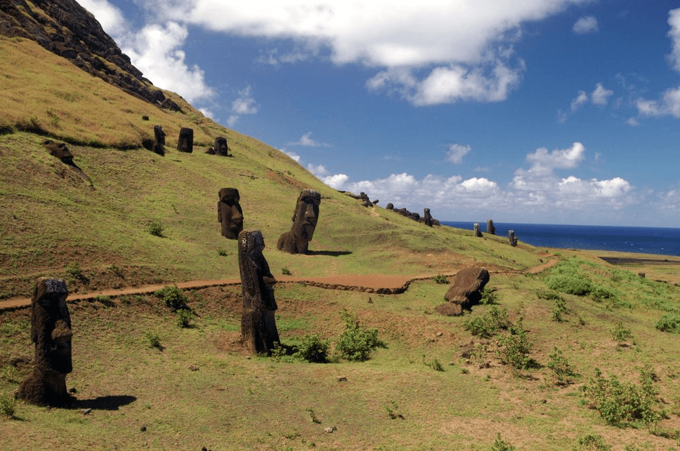 Moai heads emerging from the mountainside of a volcano on Easter Island, the island being where rapamycin was discovered