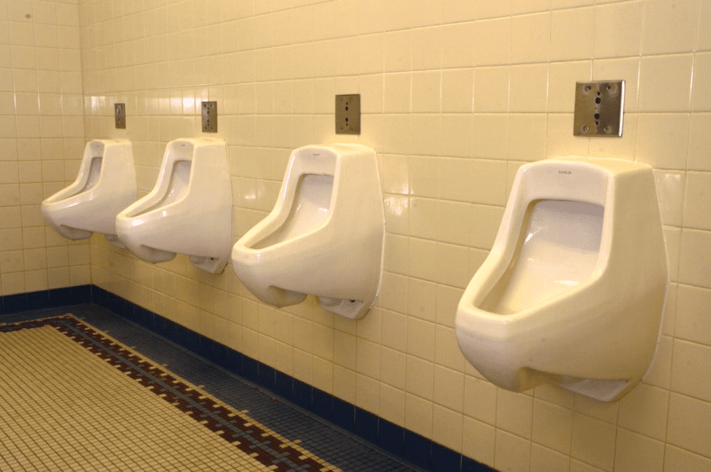 A row of urinals, representing a possibly distressing situation for someone with paruresis