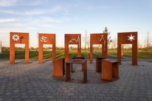 interfaith monument in Germany with symbols of different belief systems